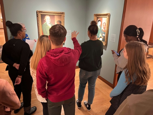 Students looking at art